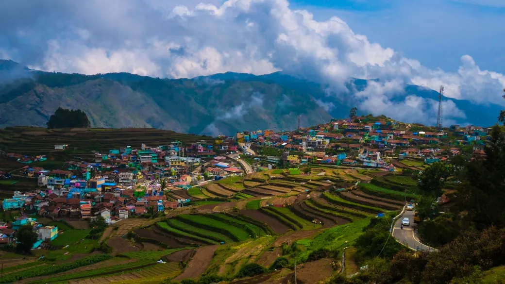 A colourful hill village among terraced fields in Kodaikanal